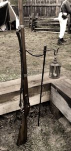 Musket and Lamp Stand